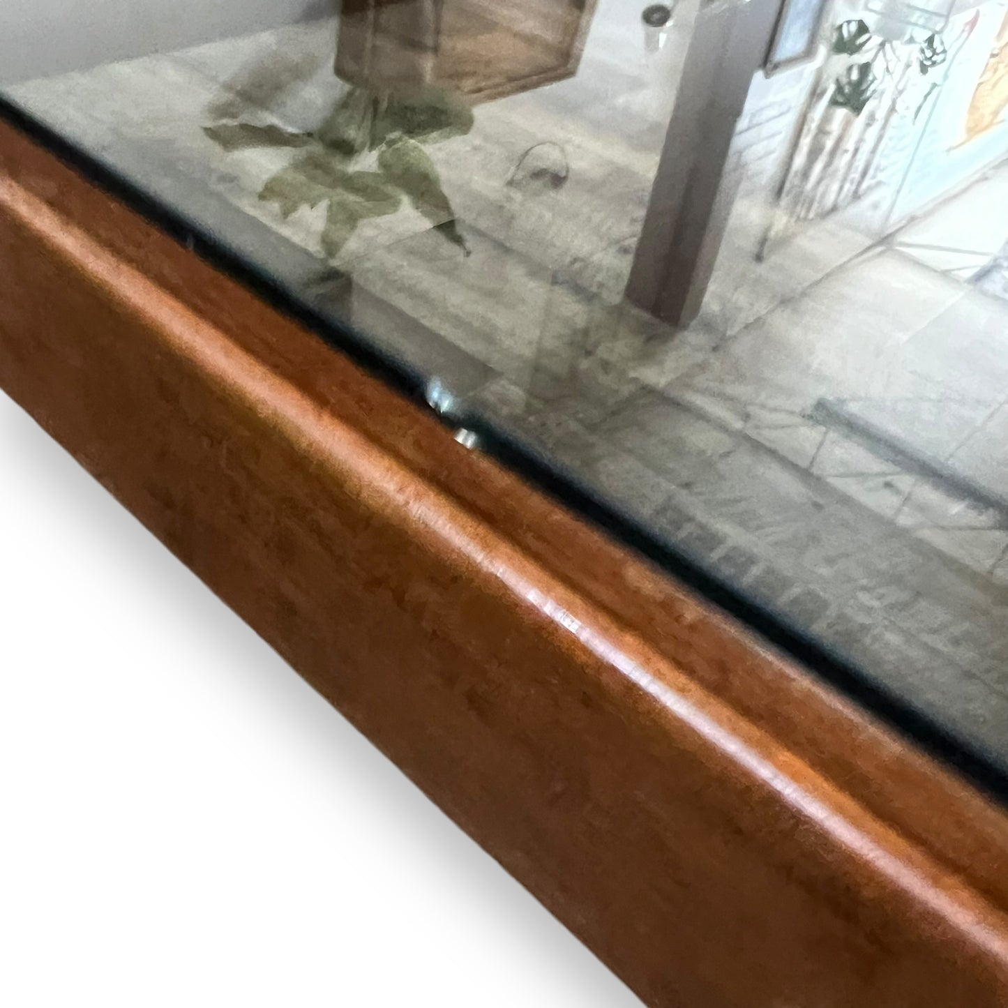 Square wooden frame coffee table with smoky glass top