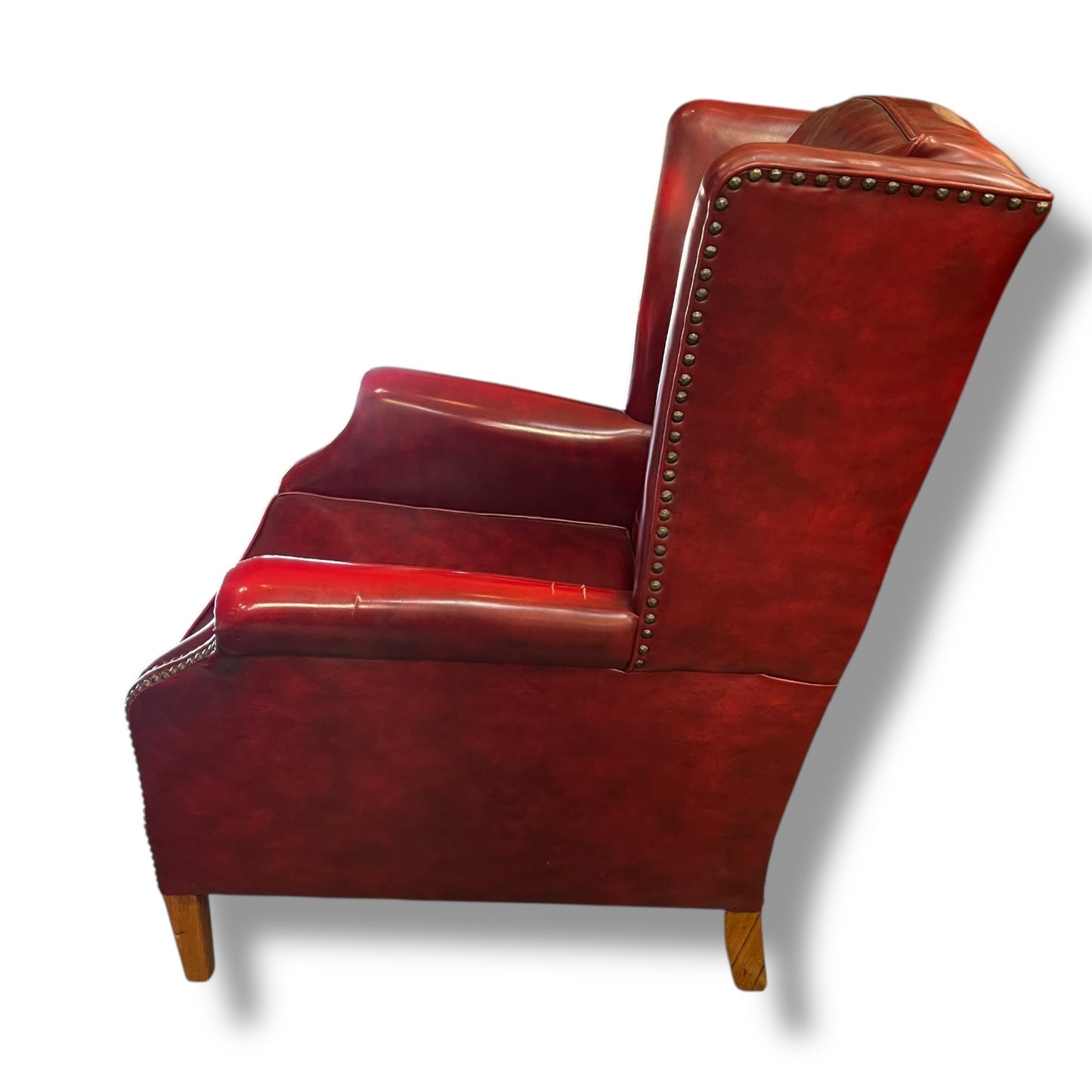 Red Wingback Armchair with Stud Detailing