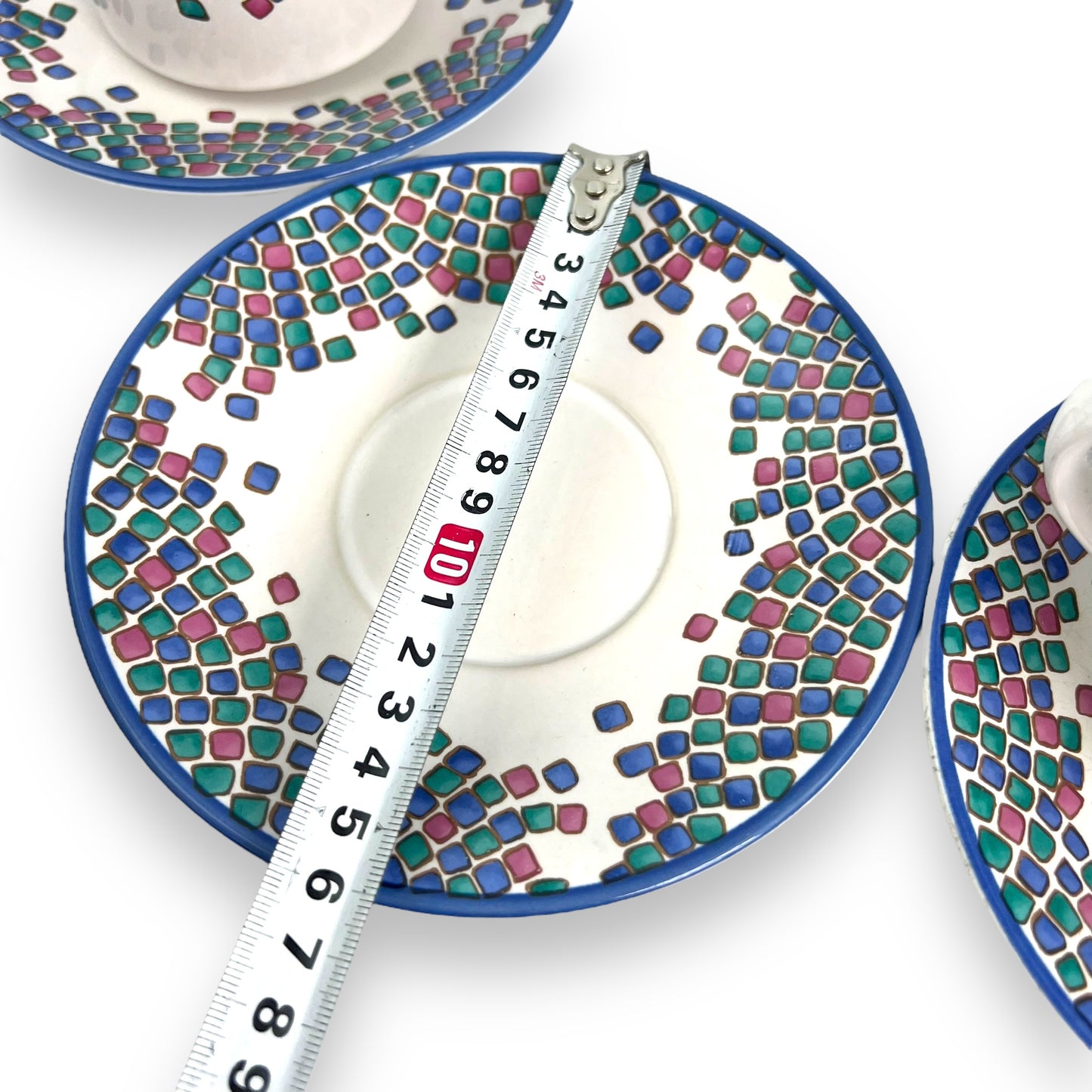 Blue, pink and green square pattern cup and saucer set