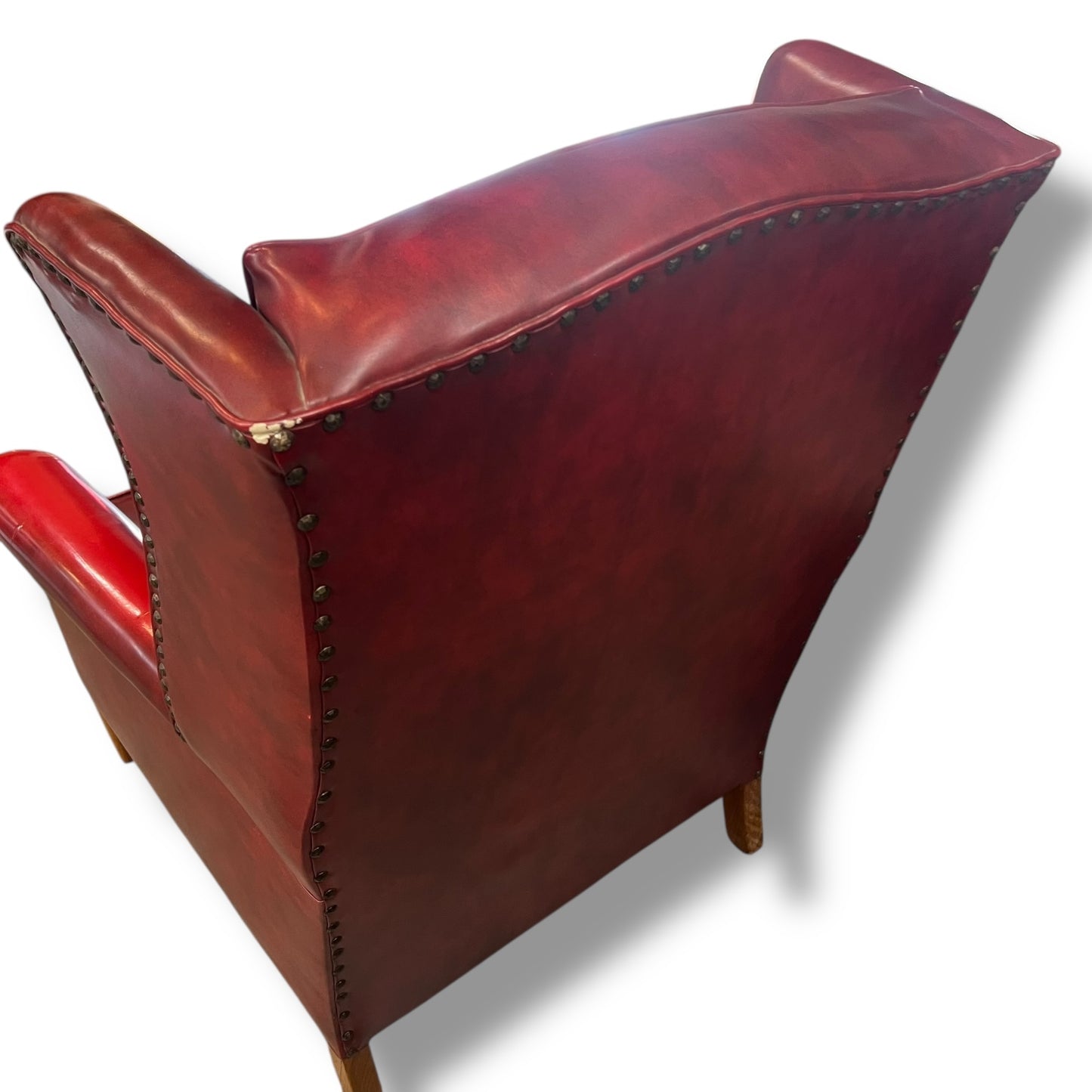 Red Wingback Armchair with Stud Detailing