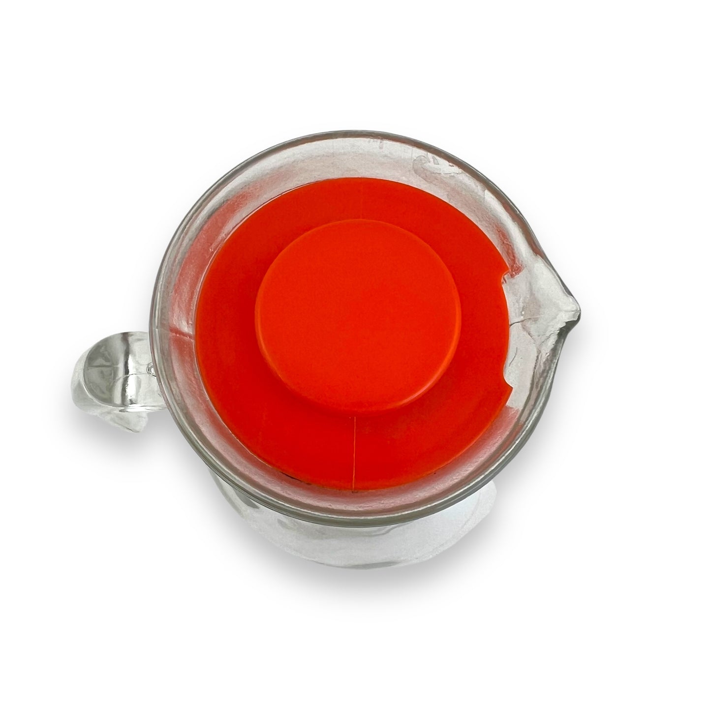 Clear jug with red plastic lid