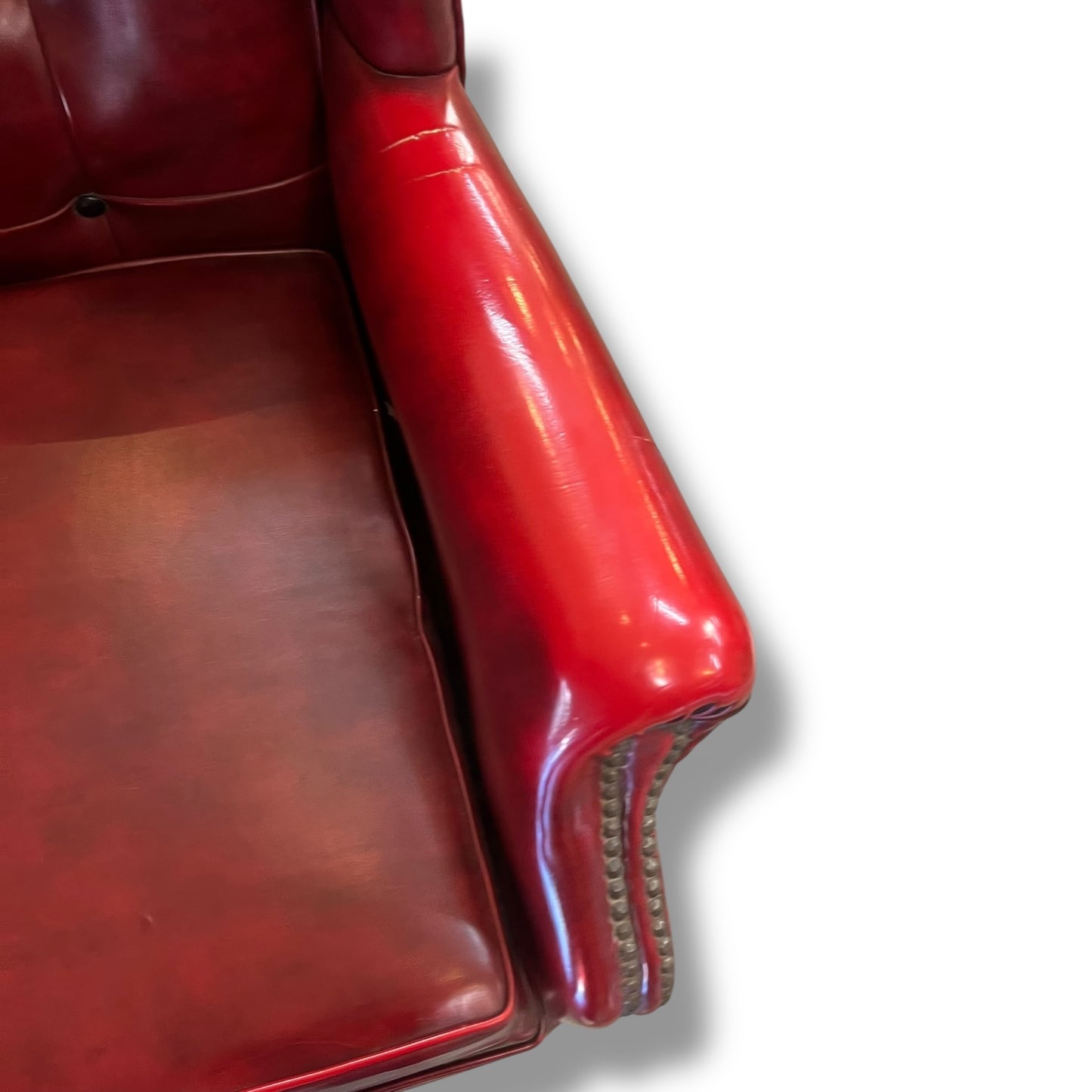 Red Wingback Armchair with Stud Detailing