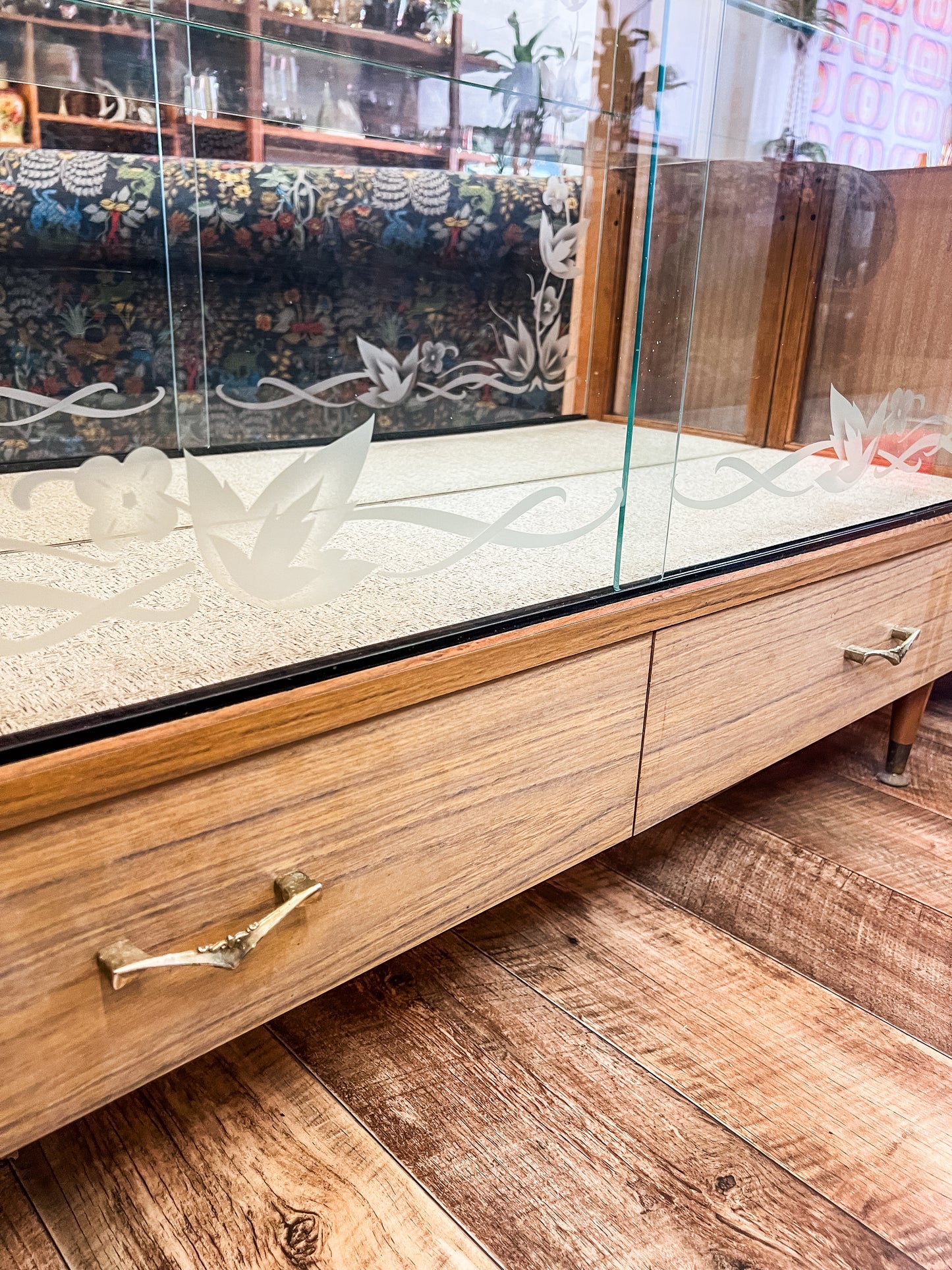 Glass Display Cabinet with Etched Floral Sliding Doors and Mirrored Back