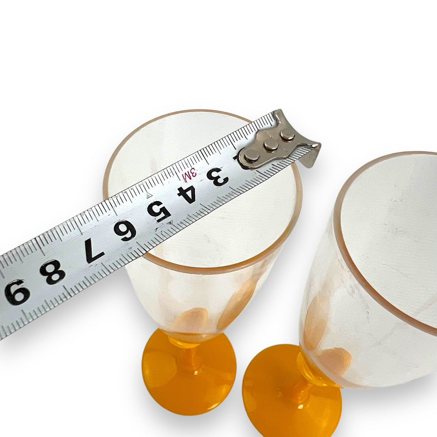 Yellow stem plastic champagne flutes set of 2 by Webb