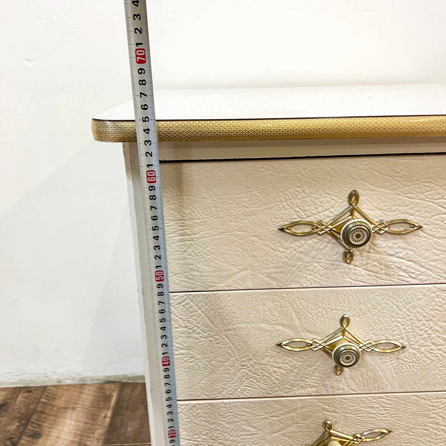 White & gold bedside table