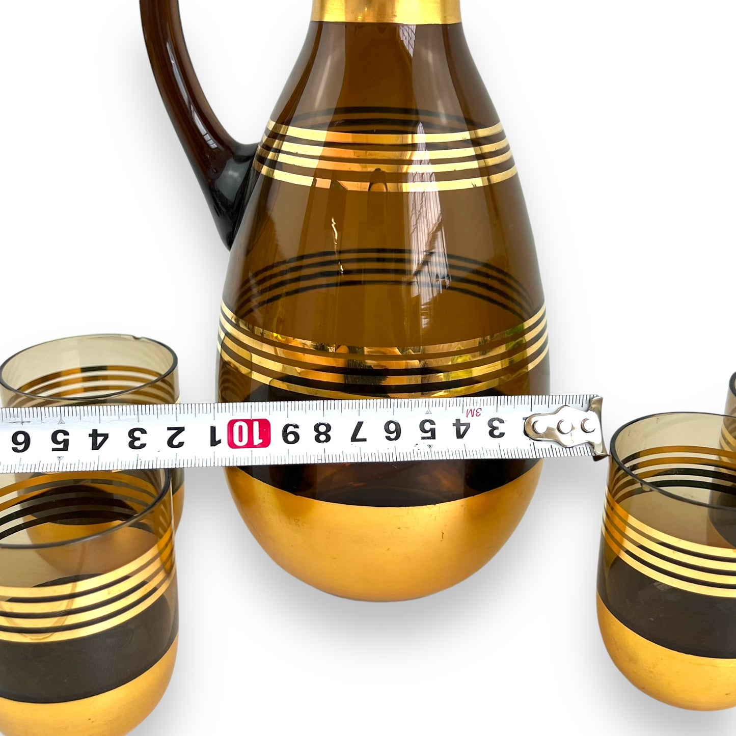 Black Smokey glass gold banded decanter & 4 matching small cups