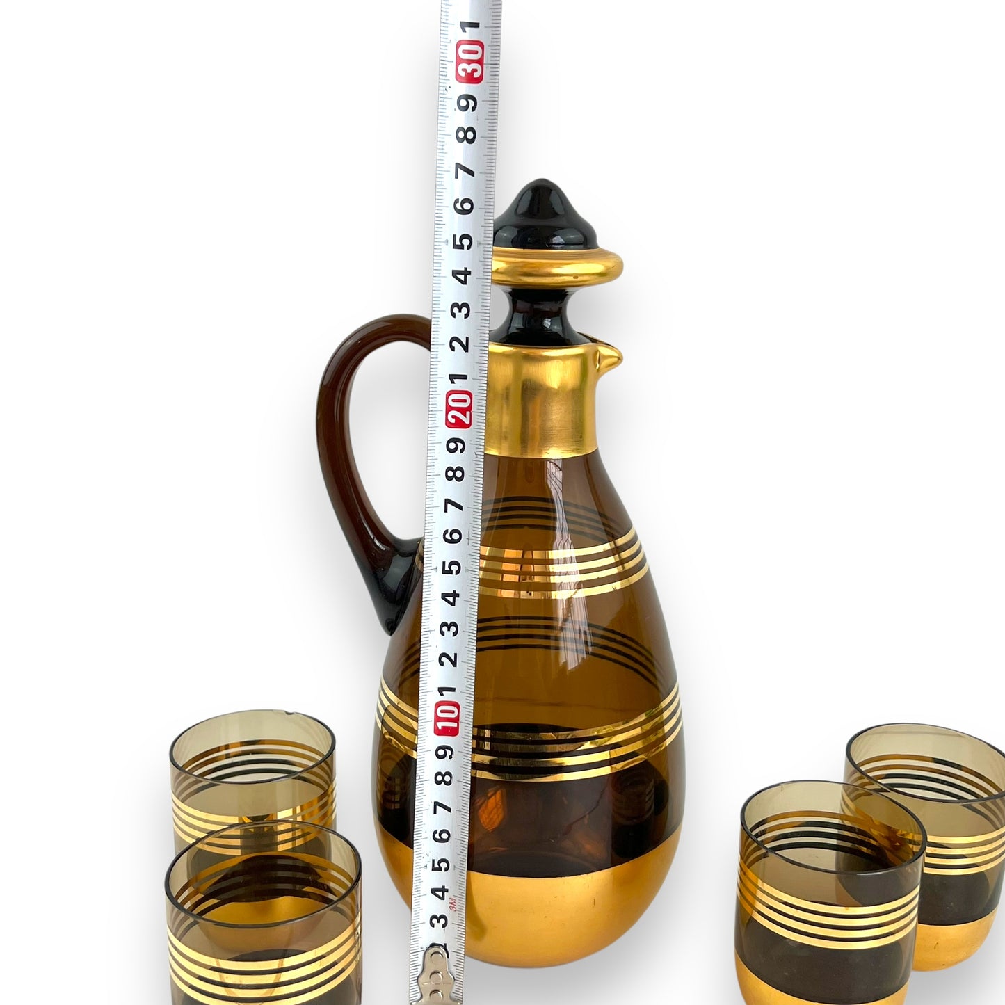 Black Smokey glass gold banded decanter & 4 matching small cups