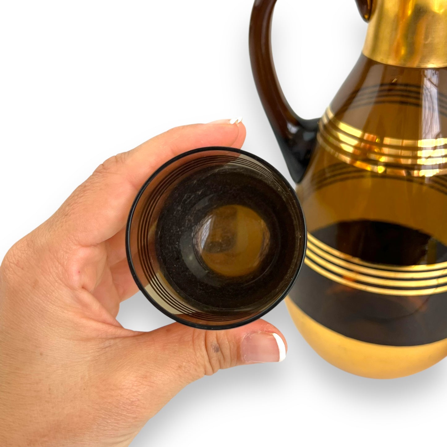Black Smokey glass gold banded decanter & 4 matching small cups