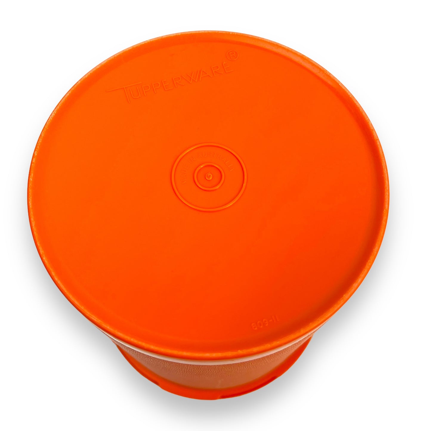 Orange Tupperware Cylinder Storage Container