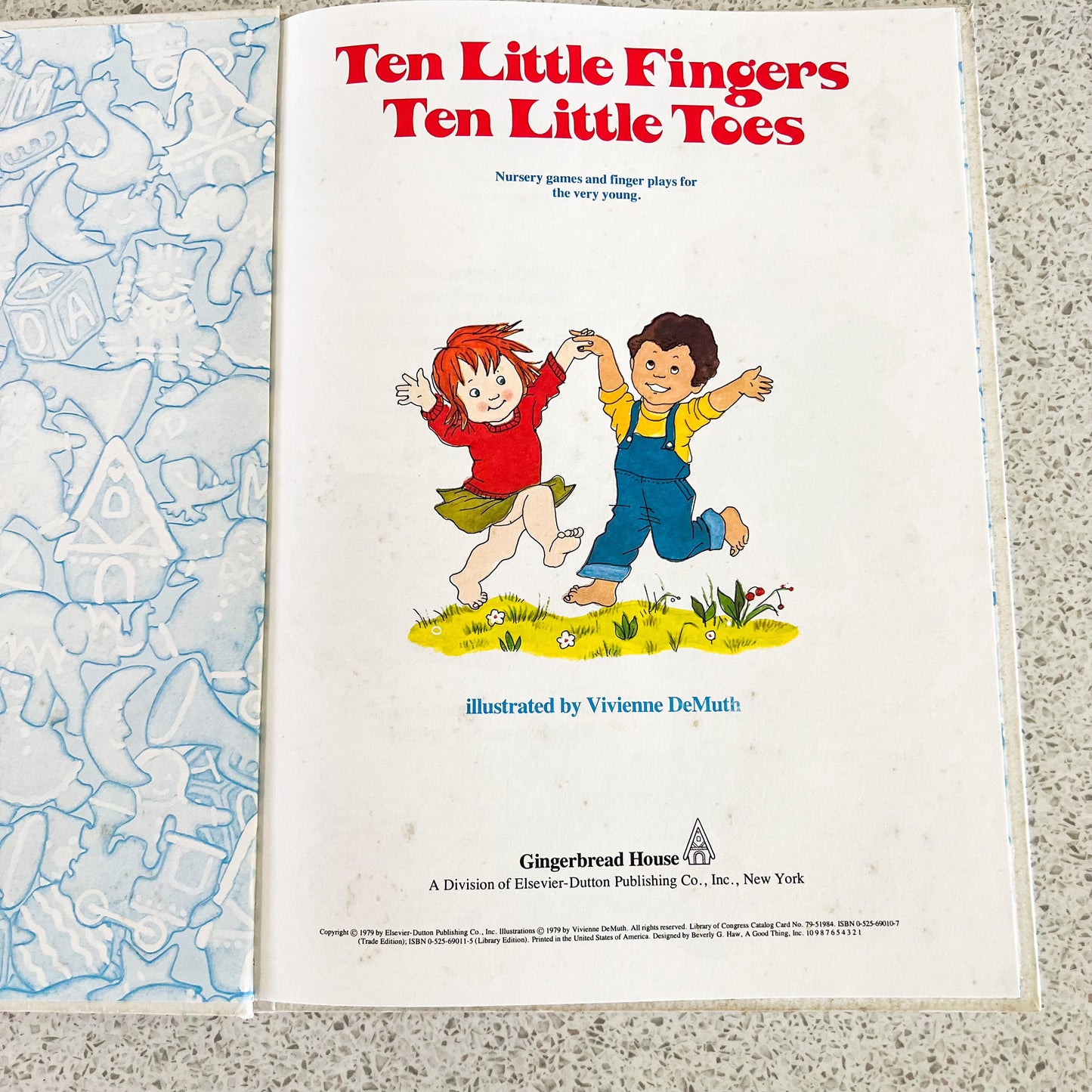 Ten Little Fingers Ten Little Toes illustrated by Vivienne DeMuth Childrens Book 1979