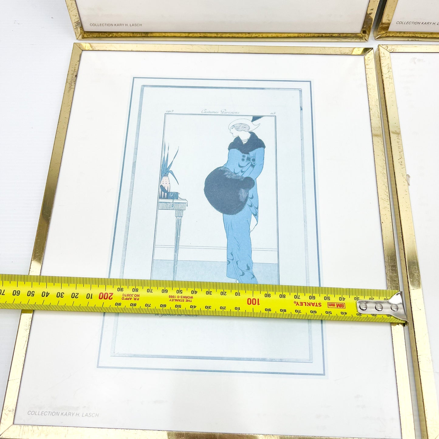 Vintage prints of ladies in elegant clothing brass frames set of 4