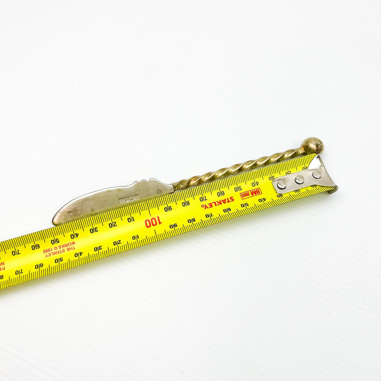 Vintage small serving utensil knife with twist handle