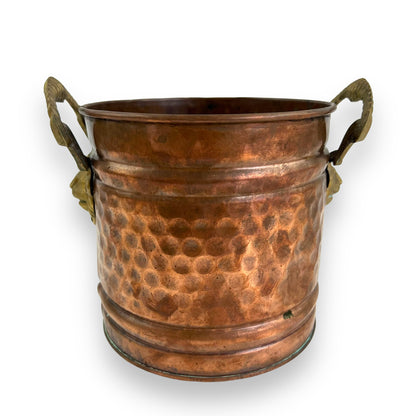 Brass and copper lion head plant pot