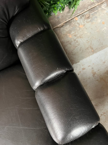 Black Button-Tufted Three-Seater Lounge with Chrome Legs