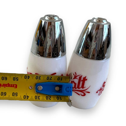 White with red writing and chrome top salt and pepper shaker set