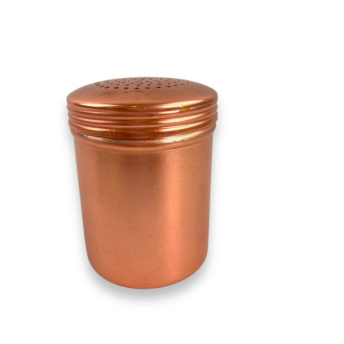 Rose gold coloured metal condiment shaker