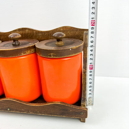 Orange Kitchen Storage Canister Jars with wooden lids and wooden hanging shelf