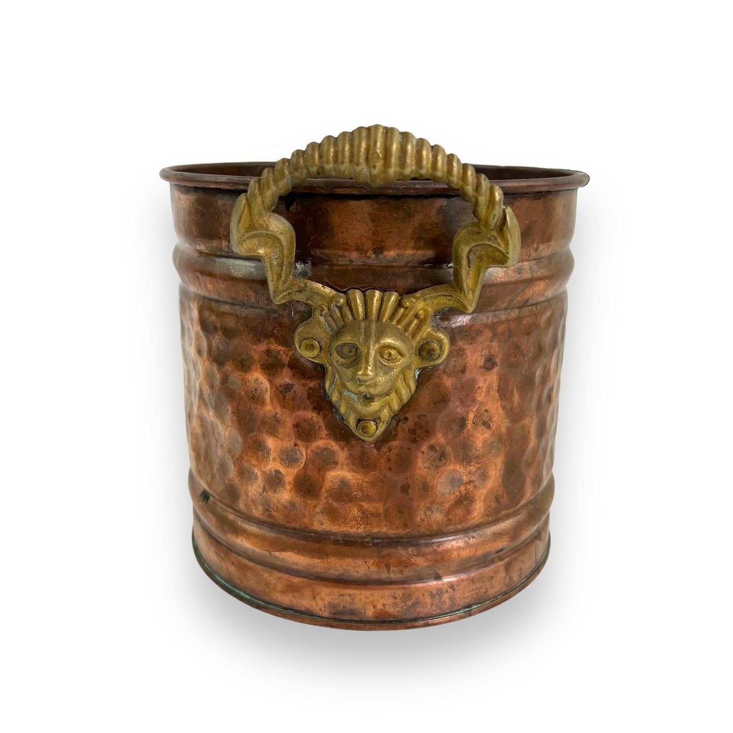 Brass and copper lion head plant pot