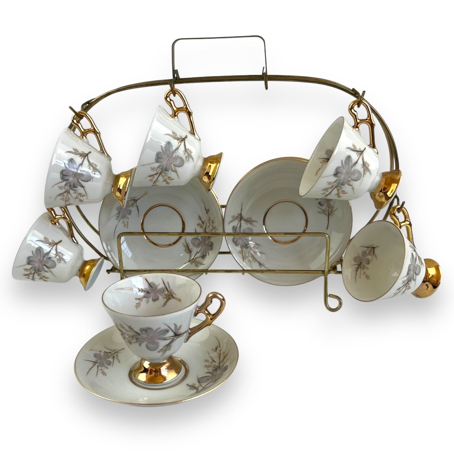 Vintage Japan Tea Cup and Saucer Set with Gold Accents and Floral Design on Brass Rack - 12 Piece Set