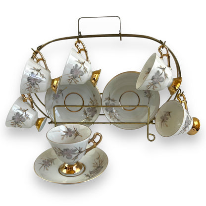 Vintage Japan Tea Cup and Saucer Set with Gold Accents and Floral Design on Brass Rack - 12 Piece Set