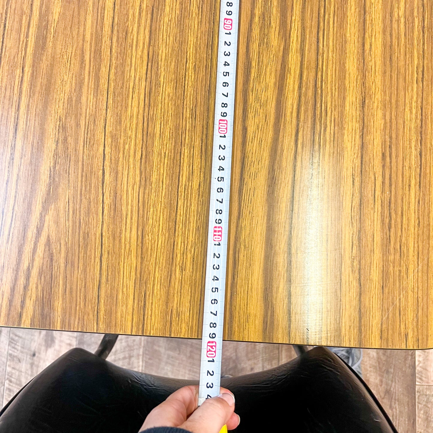 Brown Laminate Octagon Dining Table and 4 Black swivel dining chairs