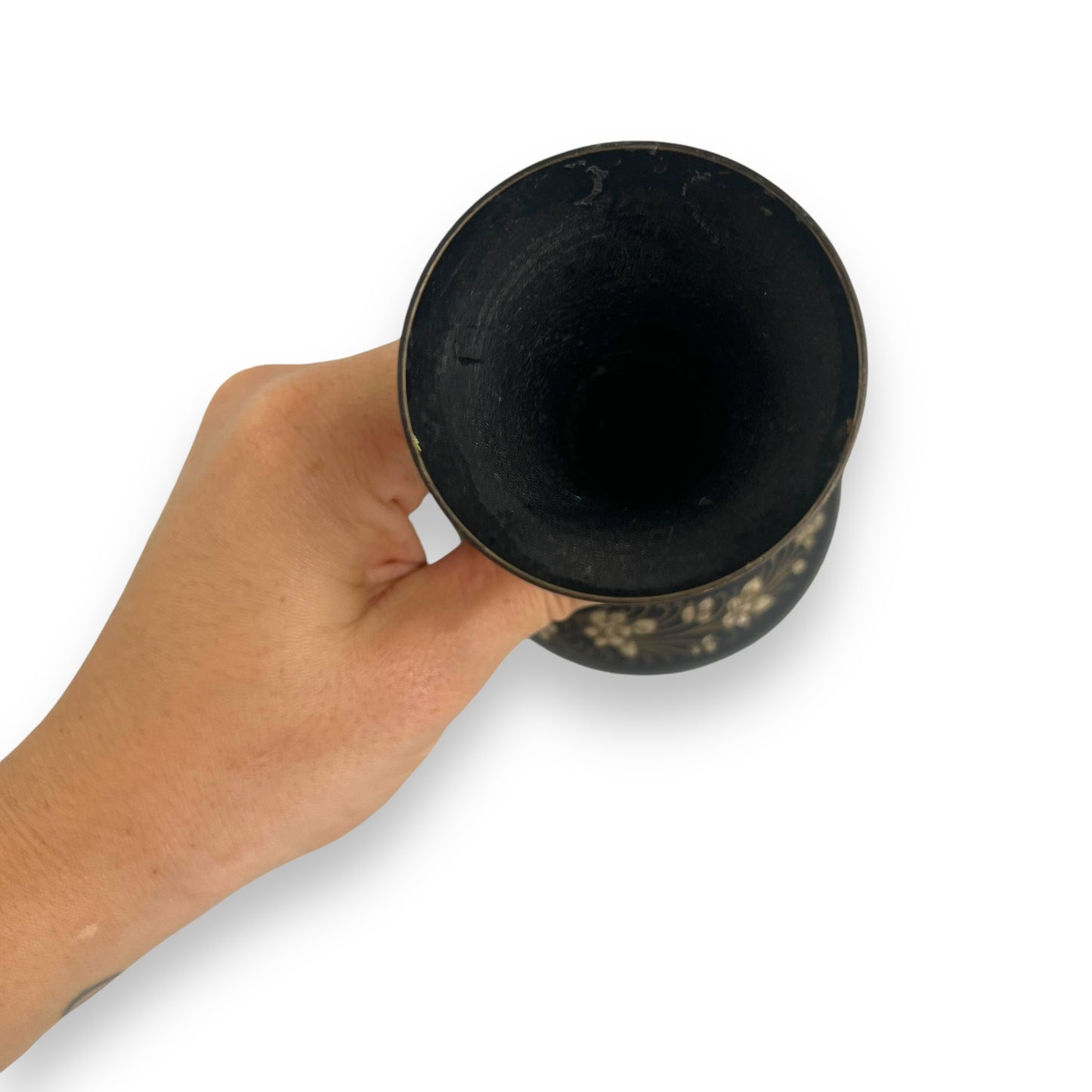 Black metal vase with gold etched flower design
