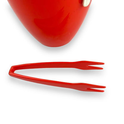 Orange red plastic ice bucket with tongs