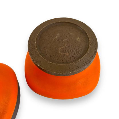 Orange and Brown Plastic Storage Canisters with suction wood look lids
