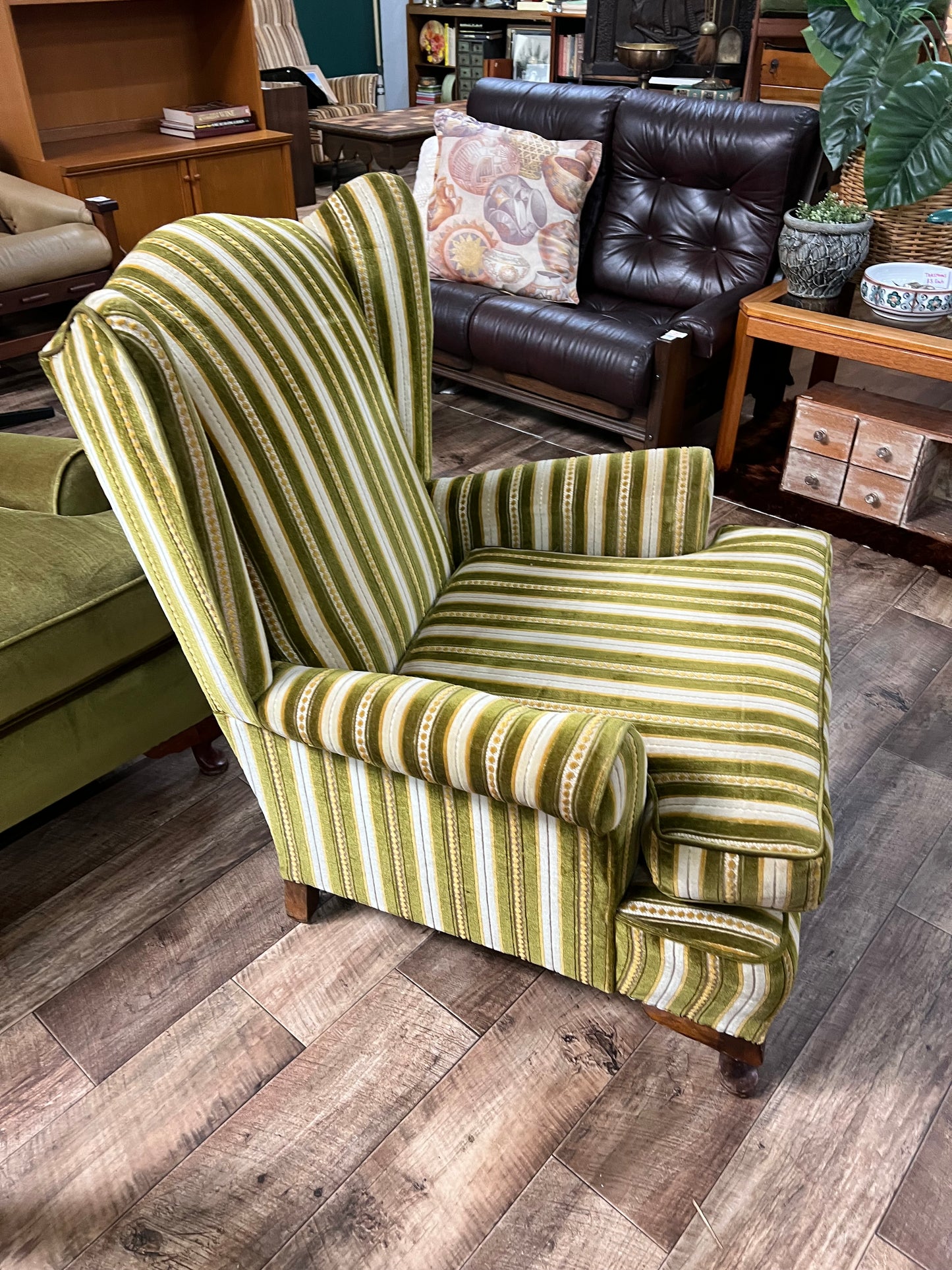 1. Vintage Green Striped Wingback Armchair