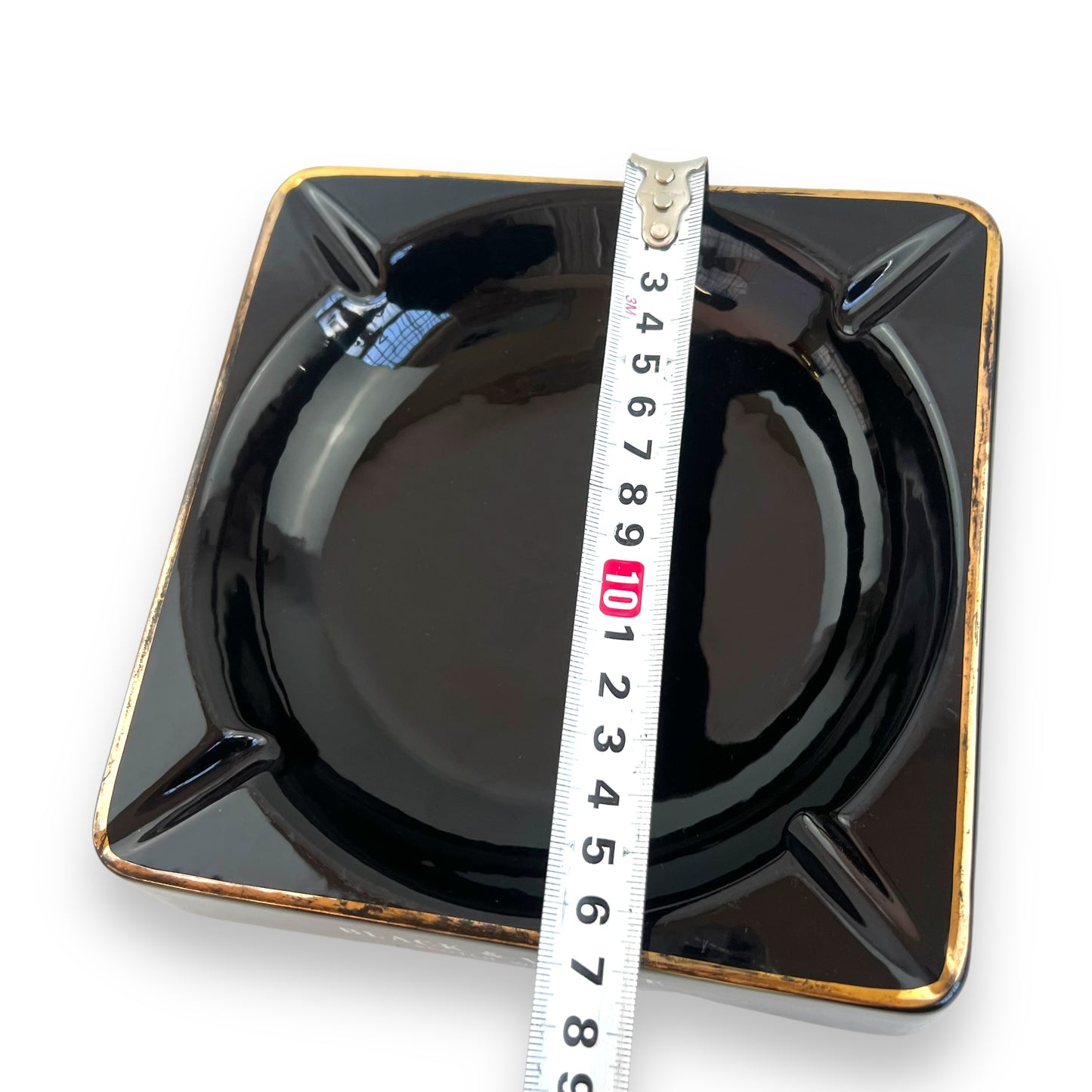 Black and white scotch whiskey branded black ceramic square ashtray