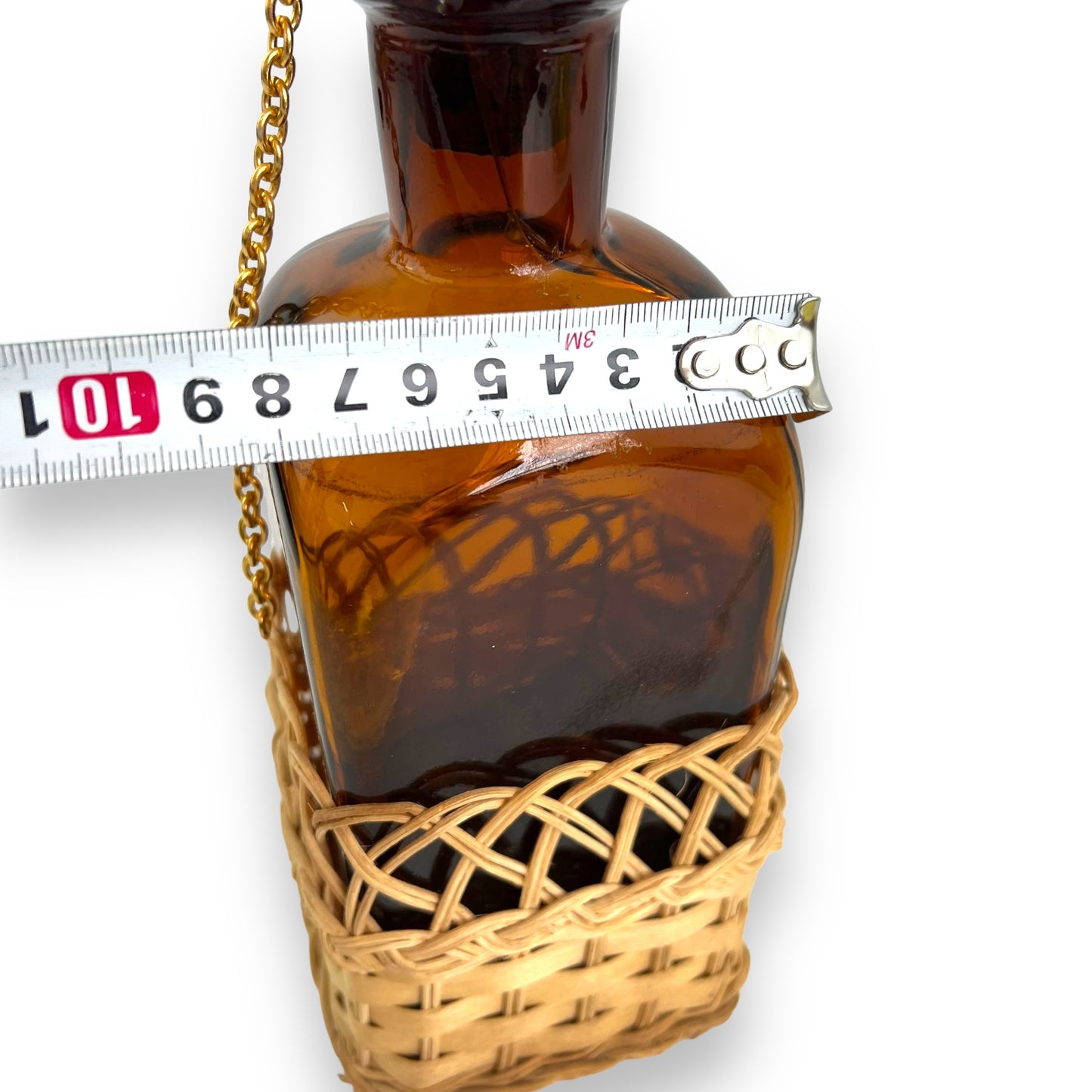 Amber glass decanter bottle with cane base and cork stopper