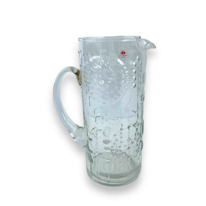 Pressed flower pattern clear glass pitcher
