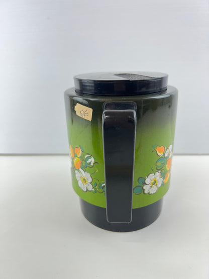 Insulated Thermos 
Green flower jug