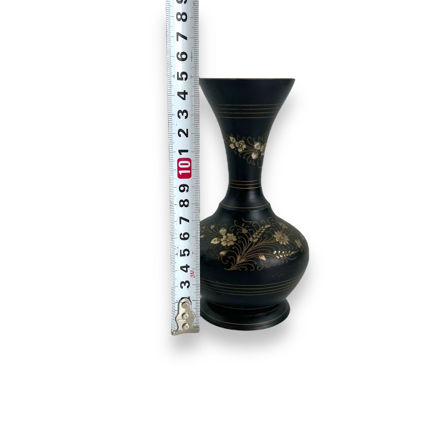 Black metal vase with gold etched flower design