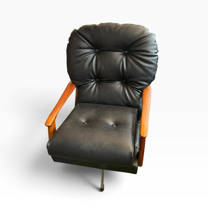 1. Black Vinyl Swivel Armchair with Timber Arms