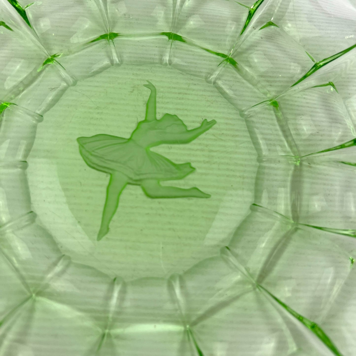 Green glass ballerina plate