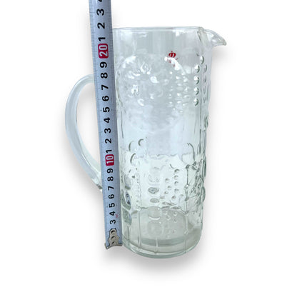 Pressed flower pattern clear glass pitcher