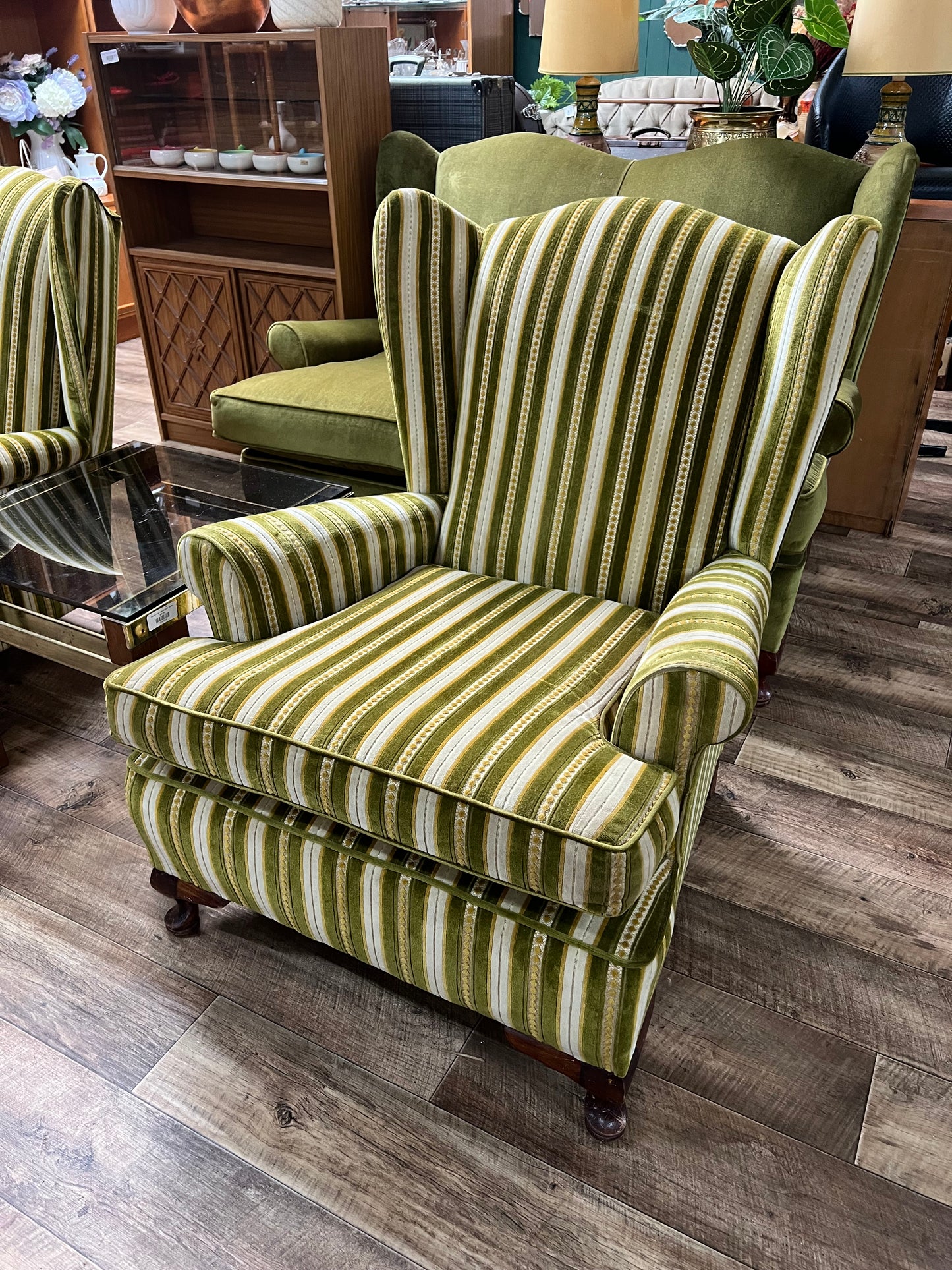 1. Vintage Green Striped Wingback Armchair