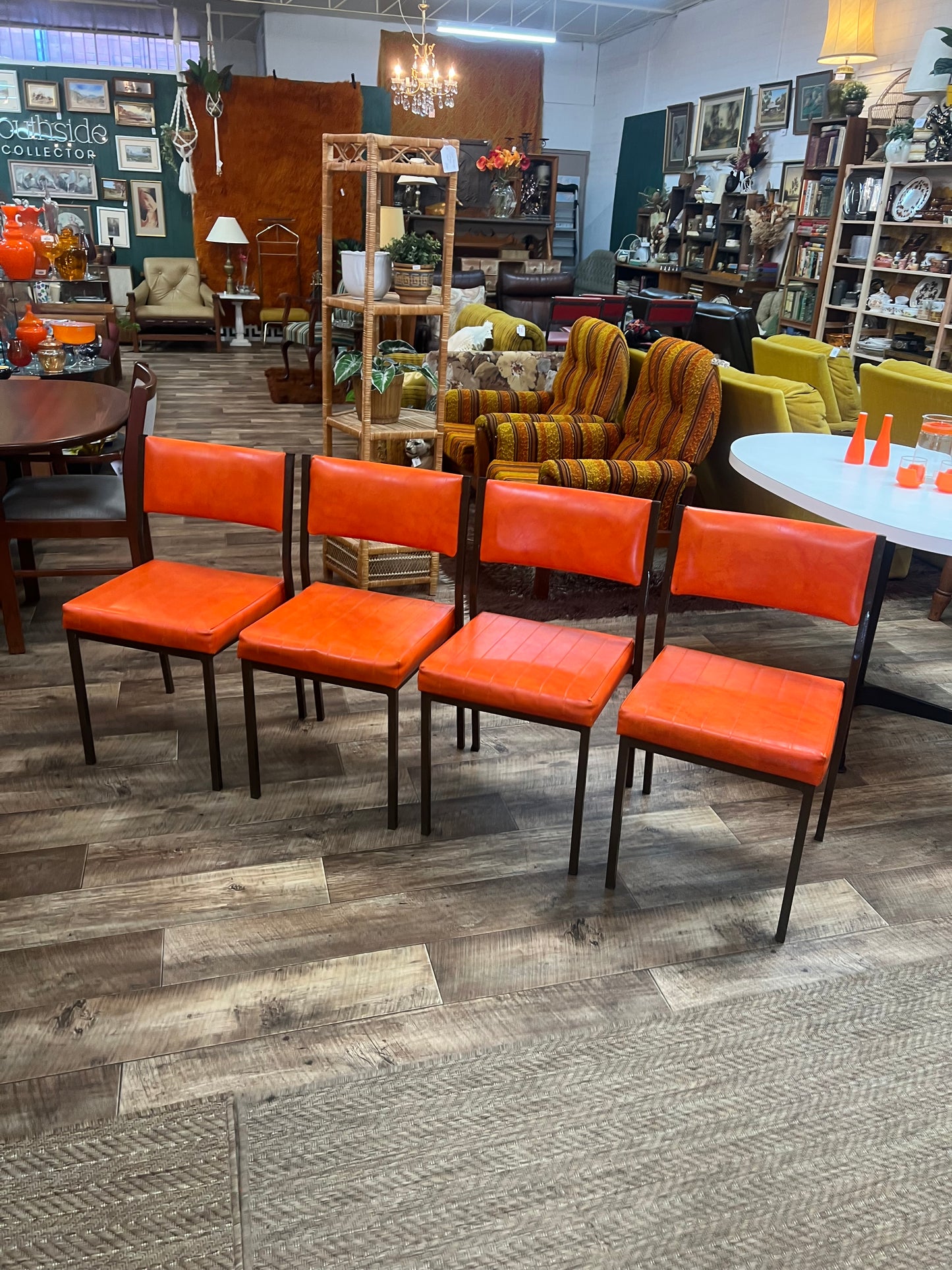 Set of 4 Mid Century Bright Orange Vinyl Dining Chairs with Dark Brown Steel Frames