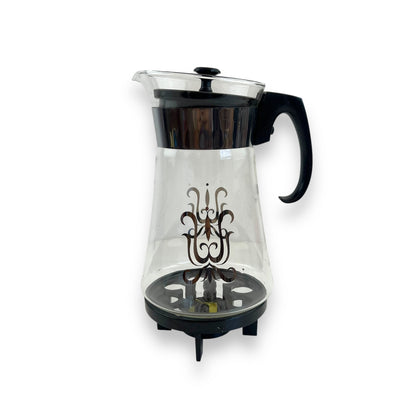 Pyrex 8-cup coffee carafe with a warming stand