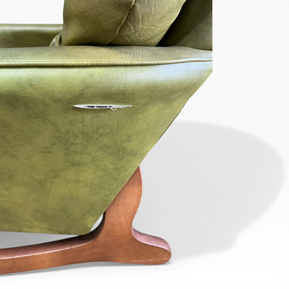 Olive Green Vinyl Lounge Armchair with Timber Sleigh Base
 (rip on side)