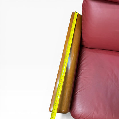 Two Seater Lounge with Sculpted Curved Timber Armrests & Burgundy Leather Cushions