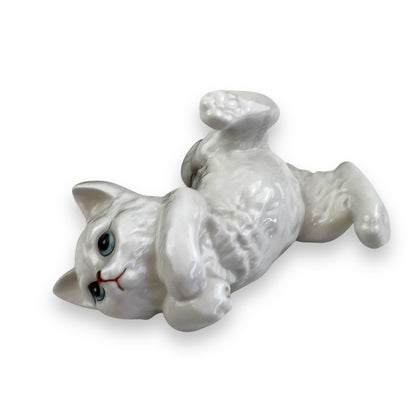Cat laying on back ornament statue