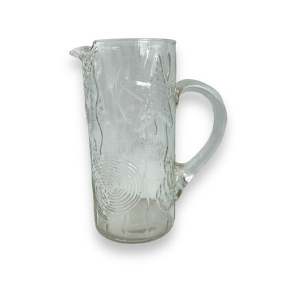 Clear glass seashell embossed pitcher jug