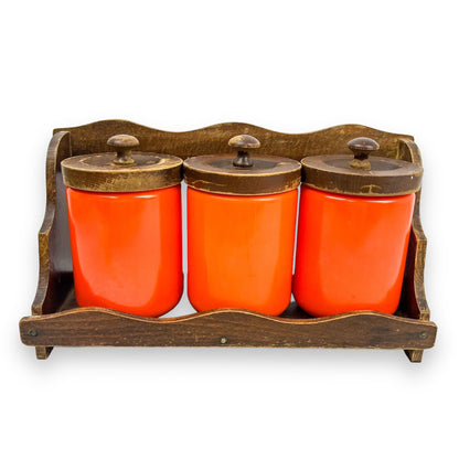 Orange Kitchen Storage Canister Jars with wooden lids and wooden hanging shelf