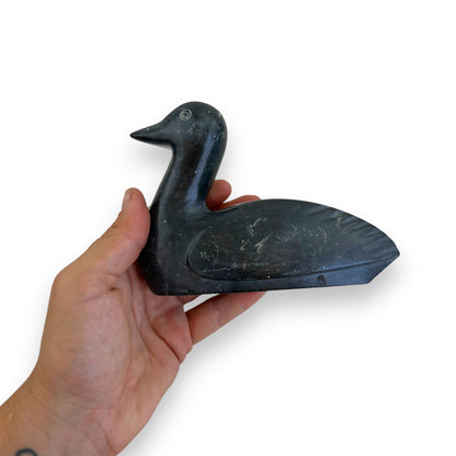 Stone carved duck statue