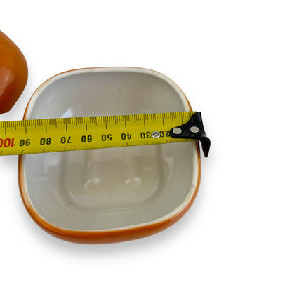 Orange pepper condiments dish with lid