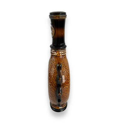 Brown Ceramic Decanter with Ship and wheel design.