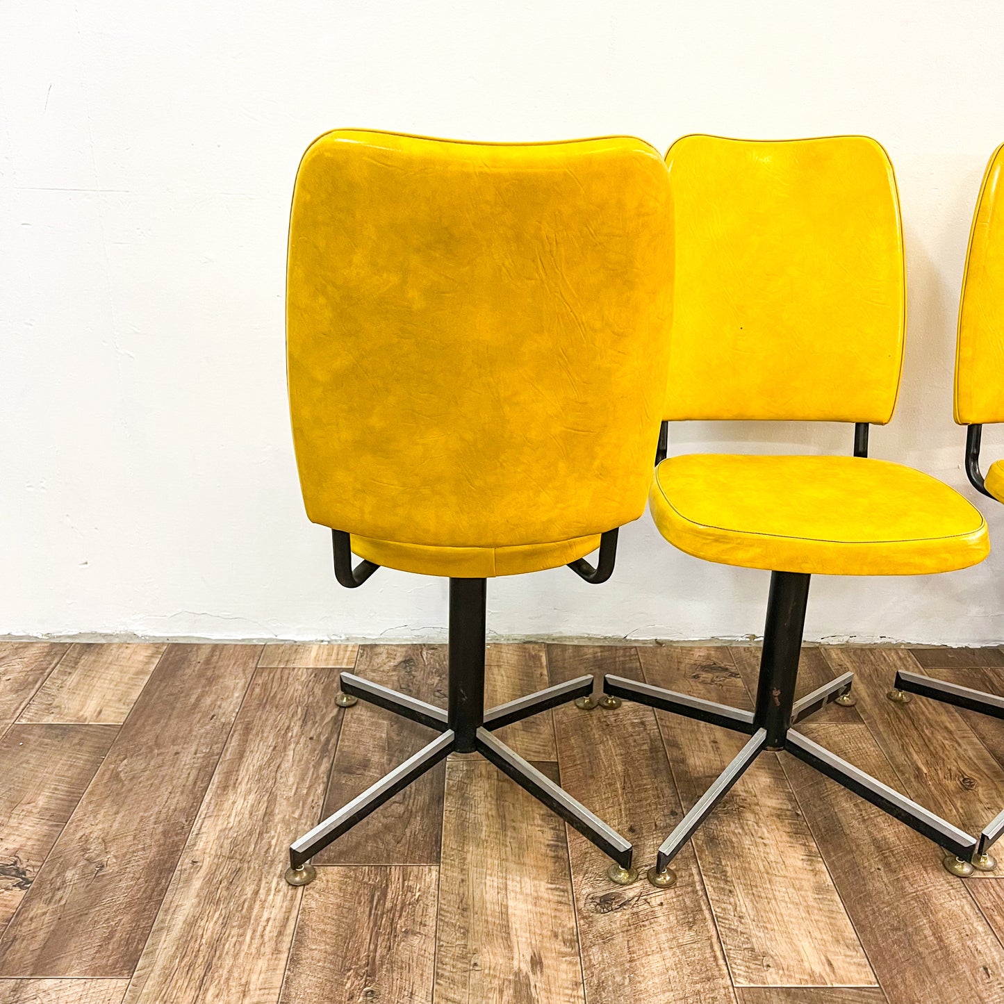 Retro yellow swivel dining chair