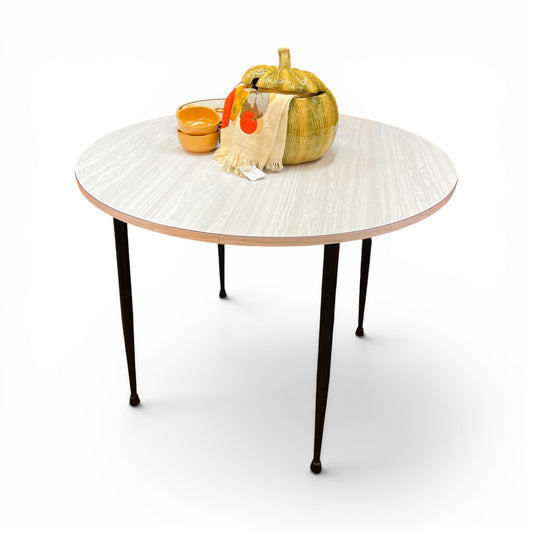 Namco Round Mid Century Dining Table with White Woodgrain Laminate Top and black steel legs